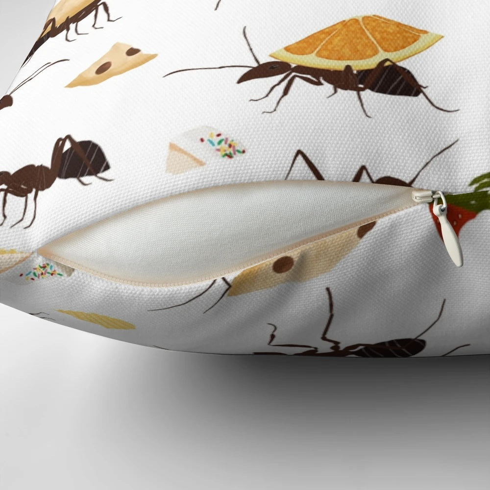 Decorative pillow featuring cute illustration of ants carrying various snacks