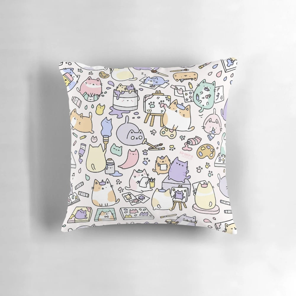 Decorative throw pillow featuring a whimsical, artistic design of cute cats