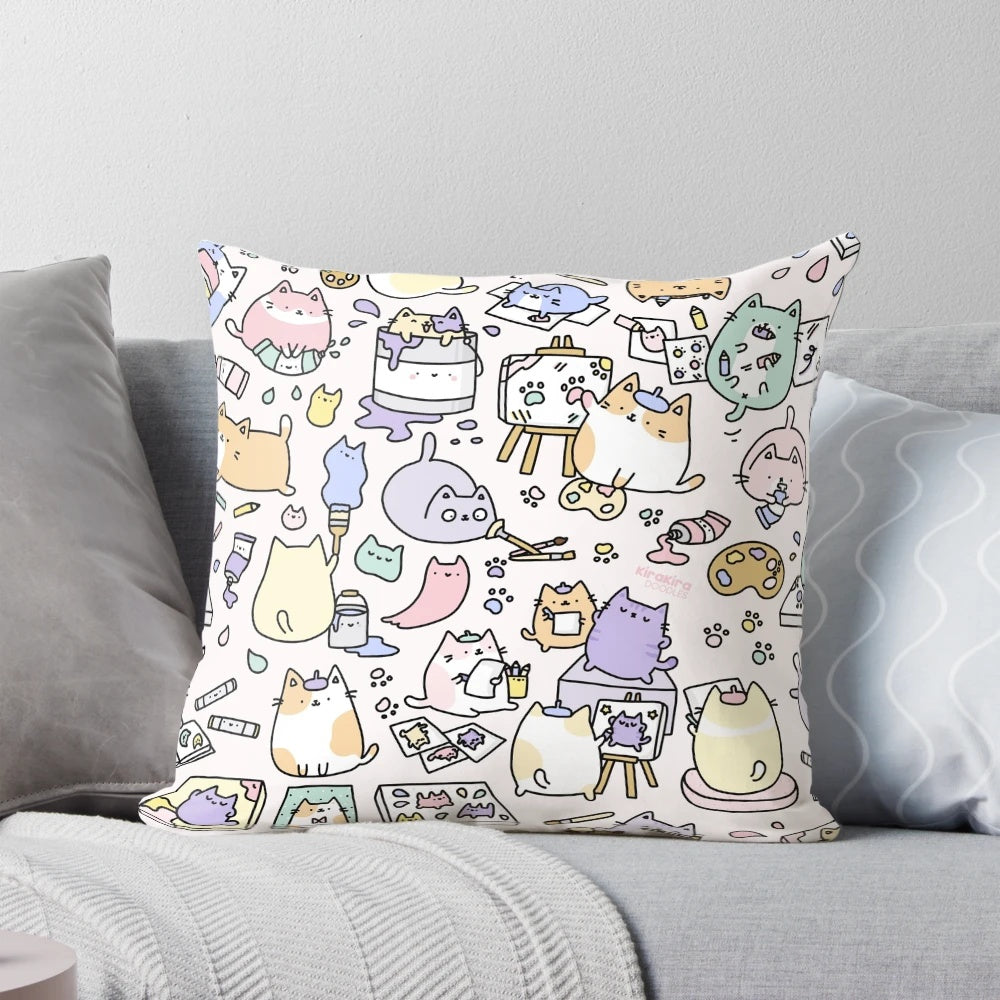 Decorative throw pillow featuring a whimsical, artistic design of cute cats
