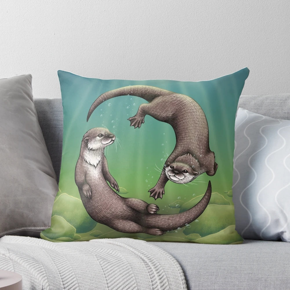 Soft and cuddly pillow featuring a playful Asian small-clawed otter swimming underwater
