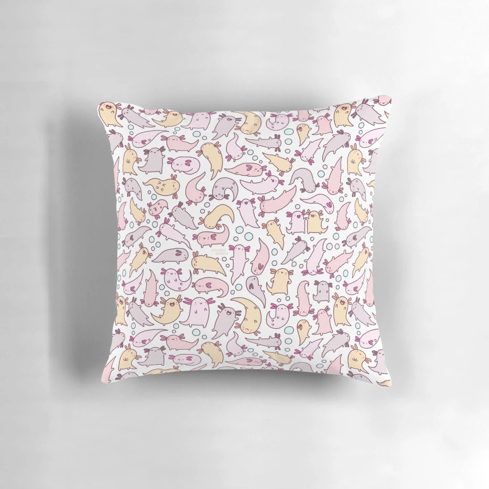 Soft, pink axolotl pillow with a cute, doodle-style design