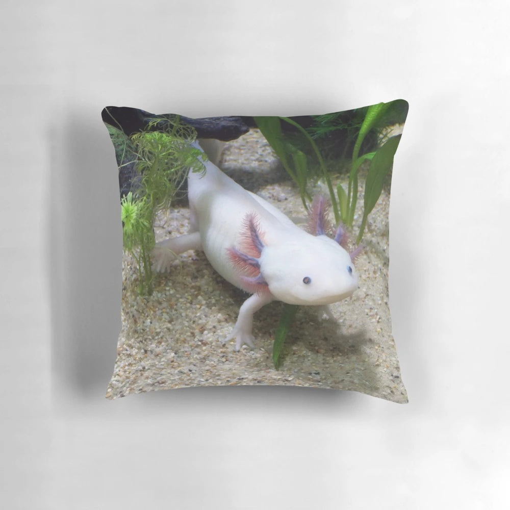 Soft, plush pillow featuring a cute, smiling axolotl design