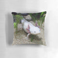 Soft, plush pillow featuring a cute, smiling axolotl design