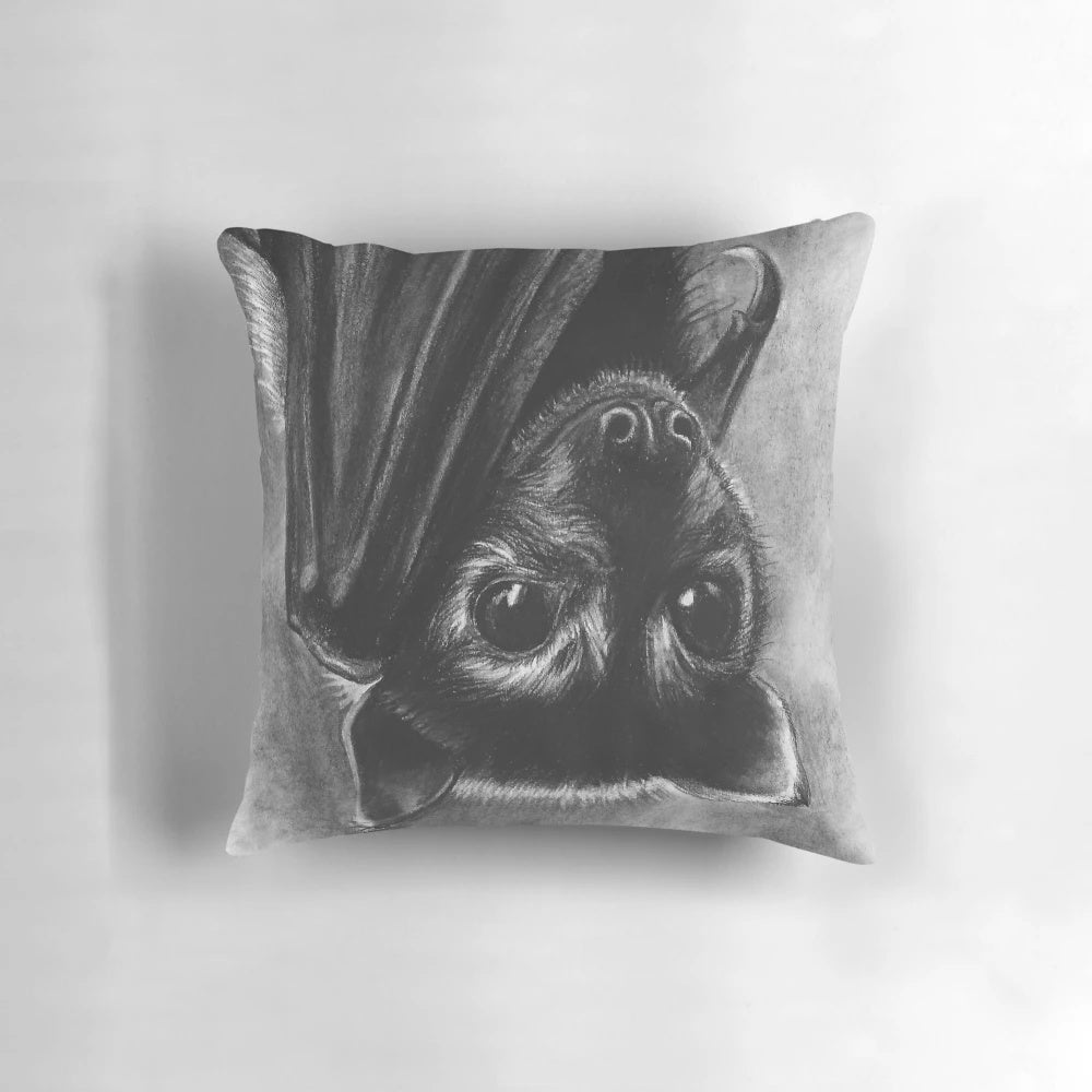 Soft, plush baby bat pillow with realistic features for a whimsical, nature-inspired look.
