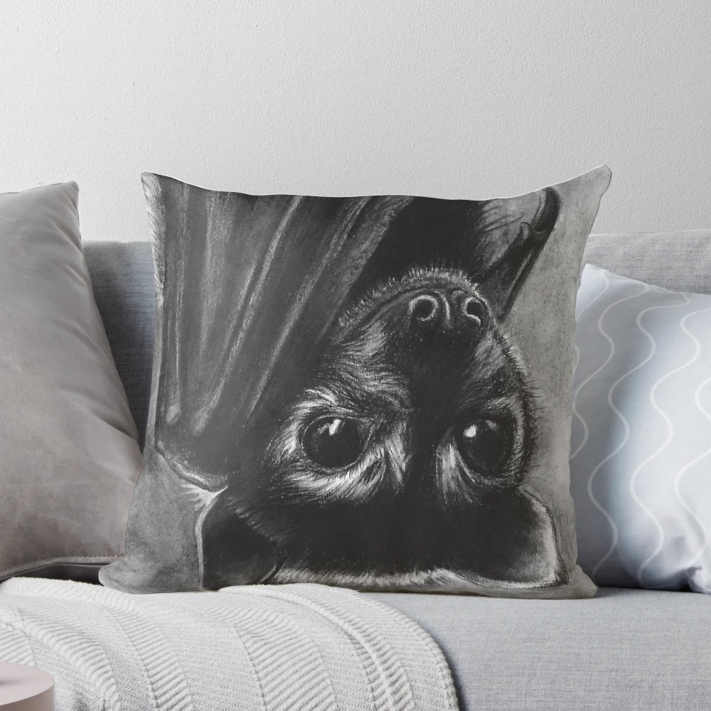 Soft, plush baby bat pillow with realistic features for a whimsical, nature-inspired look.