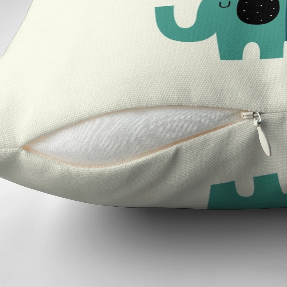 Colorful baby elephant pillow with rainbow design, perfect for kids' room or nursery