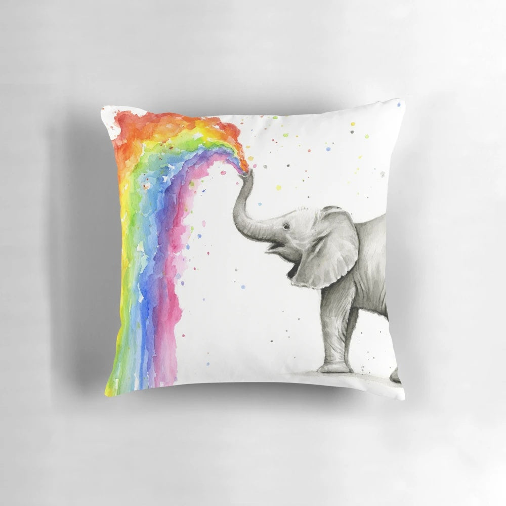 Illustrated baby elephant spraying a vibrant rainbow