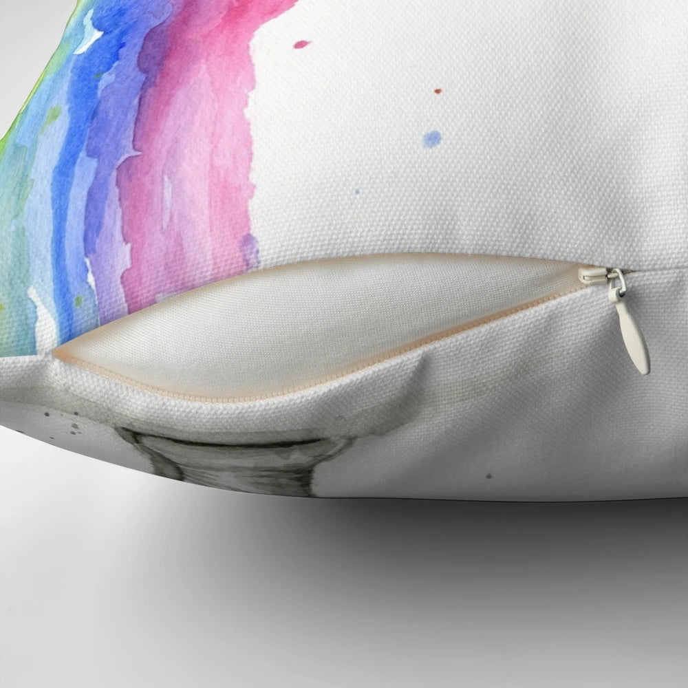 Illustrated baby elephant spraying a vibrant rainbow
