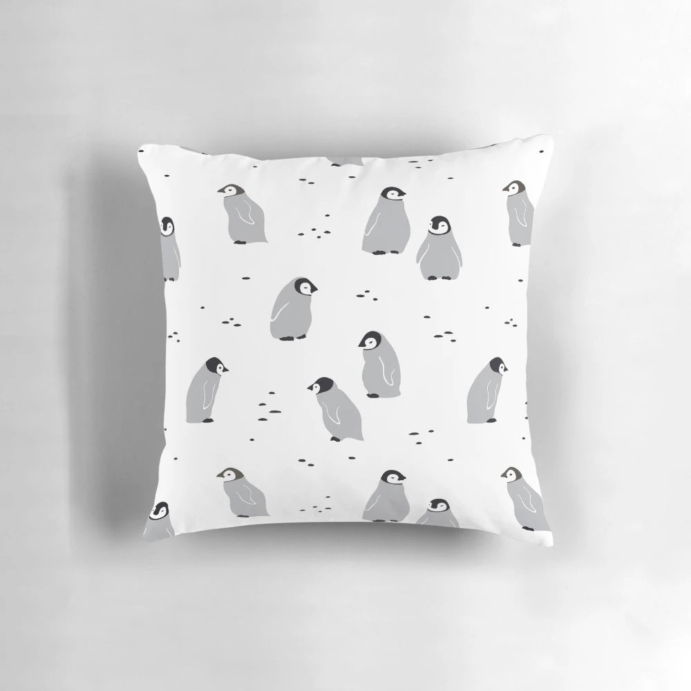 Soft, plush pillow featuring a cute, minimalist design of a baby emperor penguin chick
