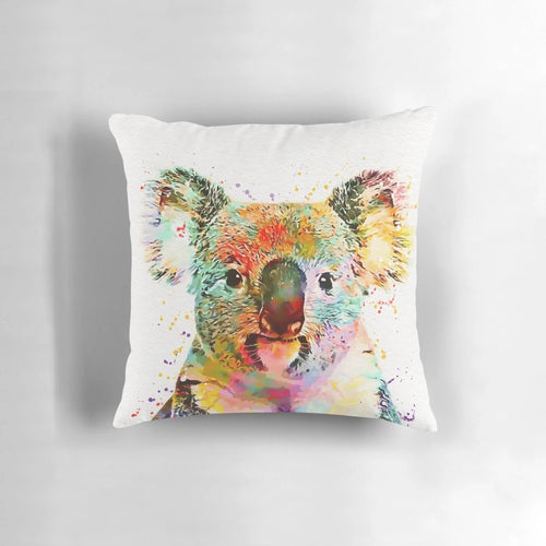 Whimsical watercolor painting of a baby koala on a soft, plush pillow.