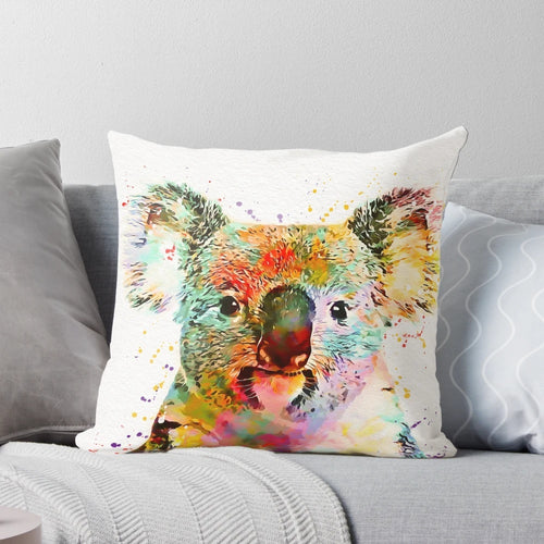 Whimsical watercolor painting of a baby koala on a soft, plush pillow.