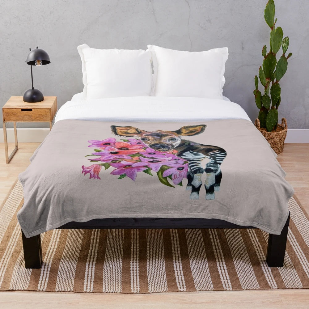 Soft and cuddly baby okapi plush blanket