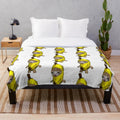 Soft and cozy plush blanket featuring a cute banana-themed cat design