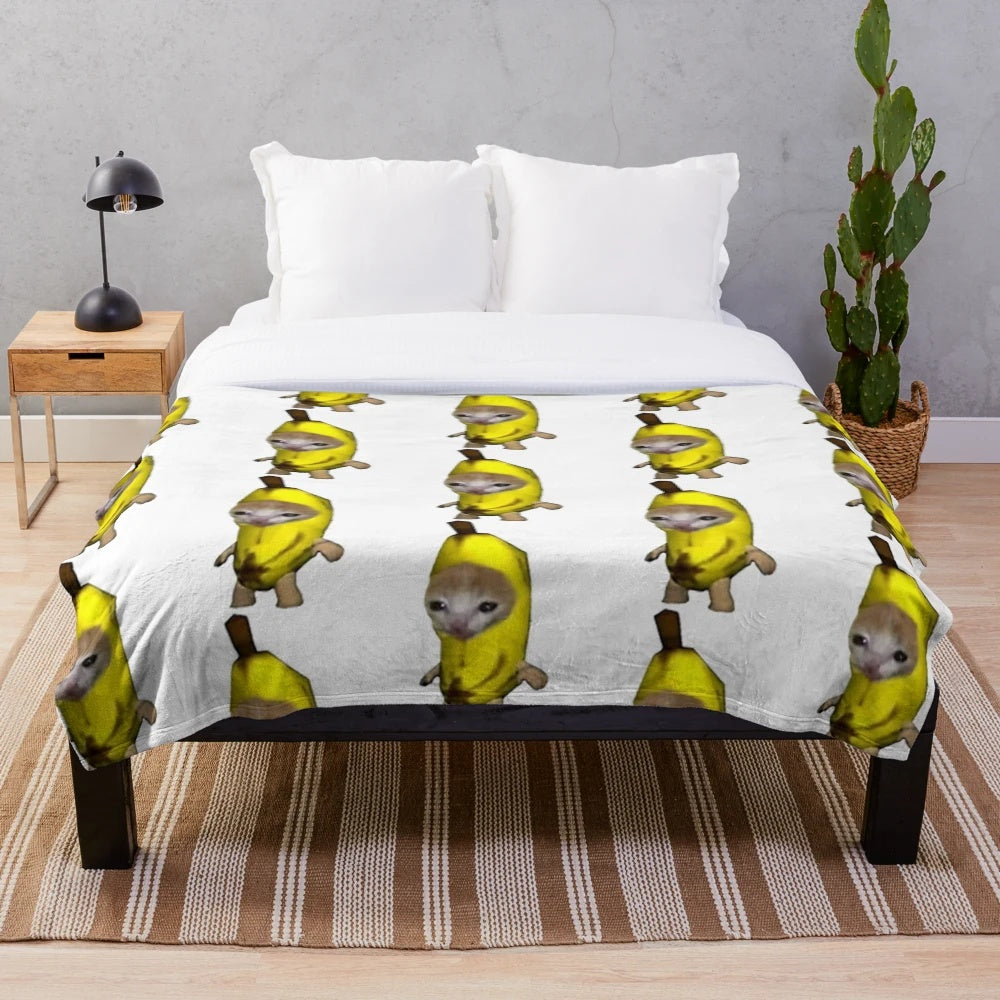 Soft and cozy plush blanket featuring a cute banana-themed cat design