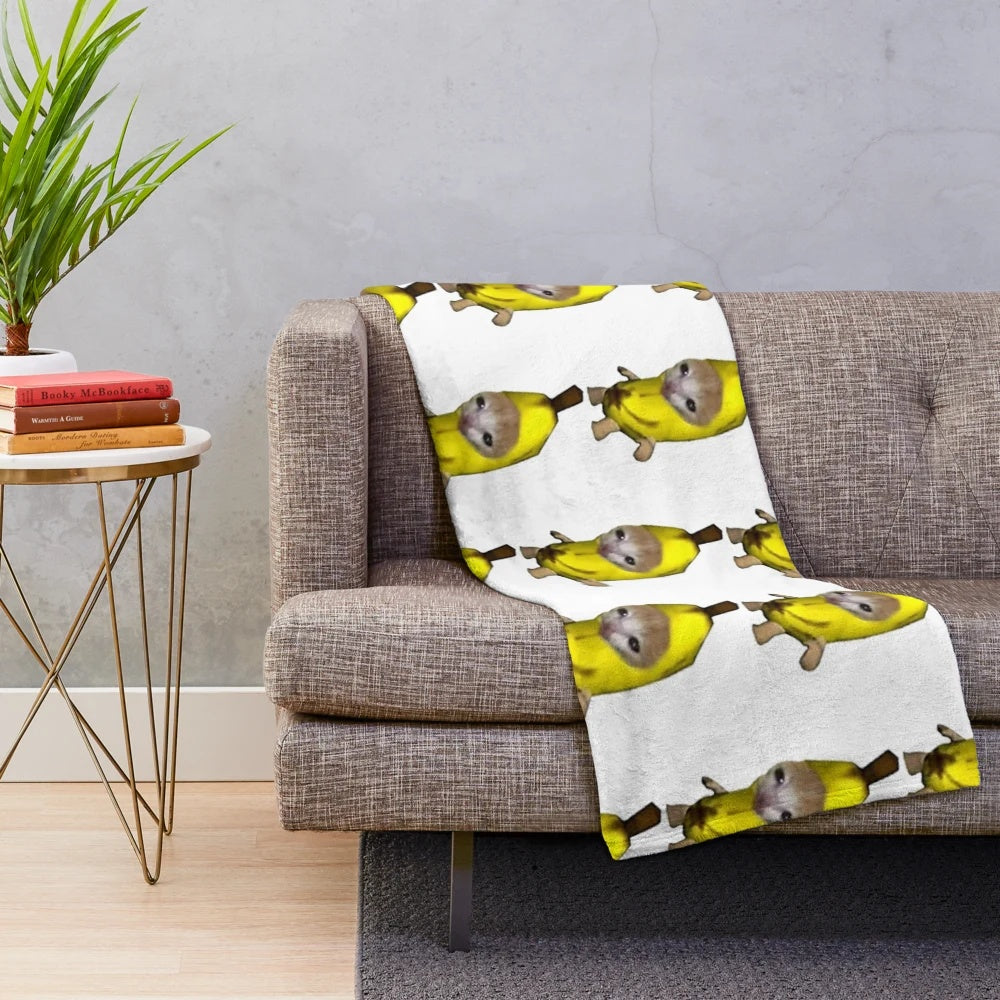 Soft and cozy plush blanket featuring a cute banana-themed cat design