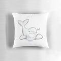 Watercolor illustration of a cute baby beluga whale on a soft, white pillow