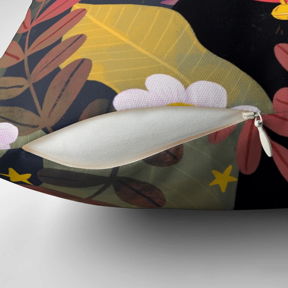 Decorative throw pillow featuring a cute black cat with big eyes surrounded by floral and plant designs
