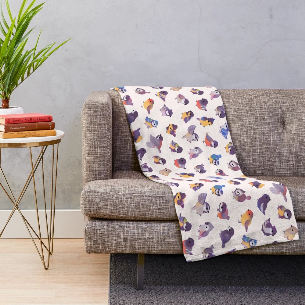 Soft, plush blanket featuring a delightful bird design, perfect for snuggling up.