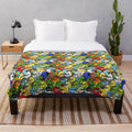 Plush blanket featuring a variety of colorful birds like cockatiel, cockatoo, and African grey