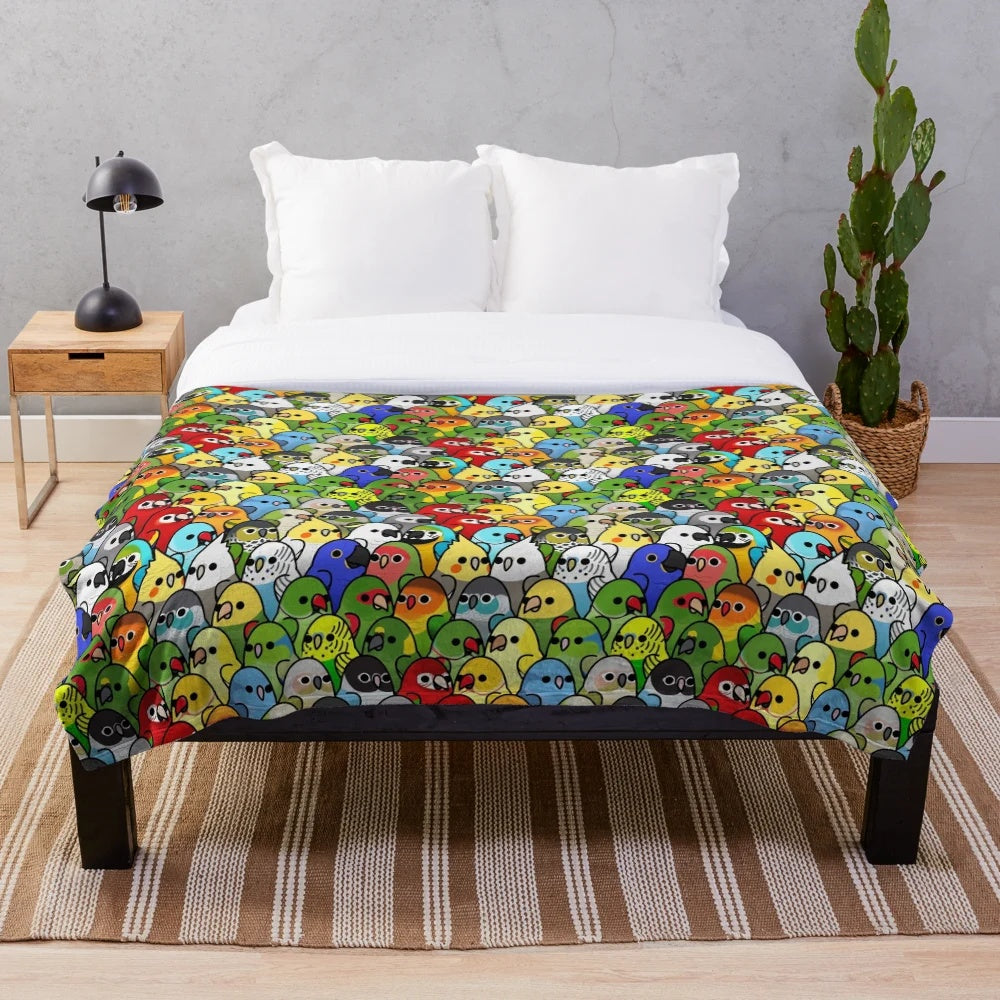 Plush blanket featuring a variety of colorful birds like cockatiel, cockatoo, and African grey