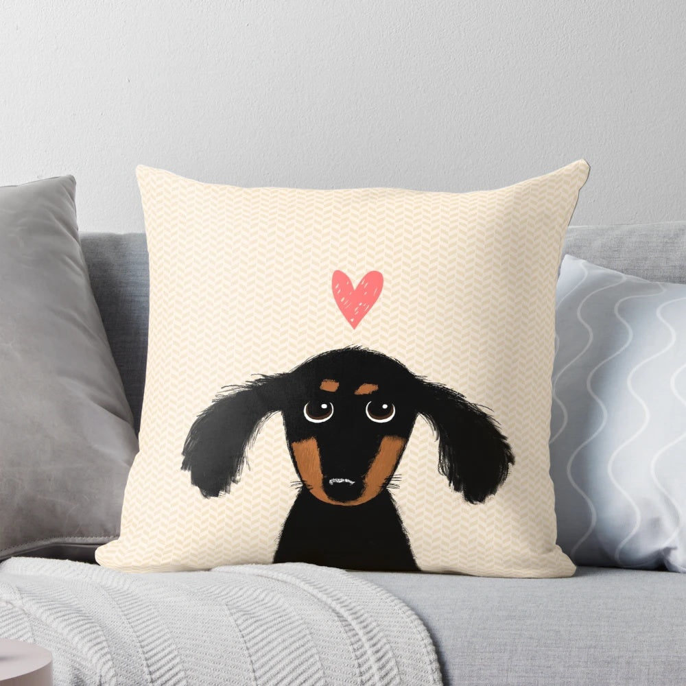 Cute dachshund puppy lying on a heart-shaped pillow