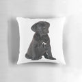 Soft, plush Cane Corso puppy pillow with realistic black fur design