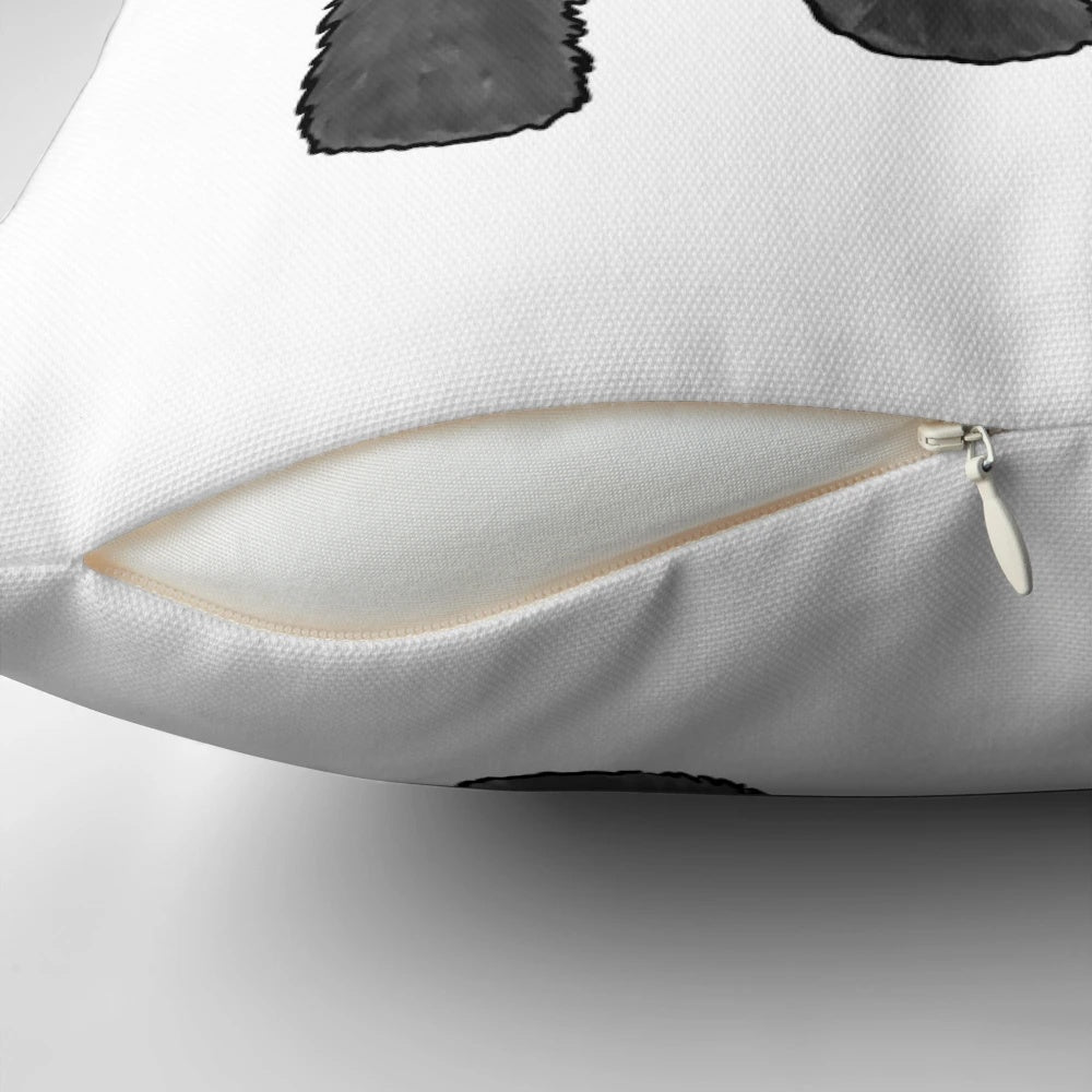 Soft, cozy black pillow featuring a cute cartoon goldendoodle design