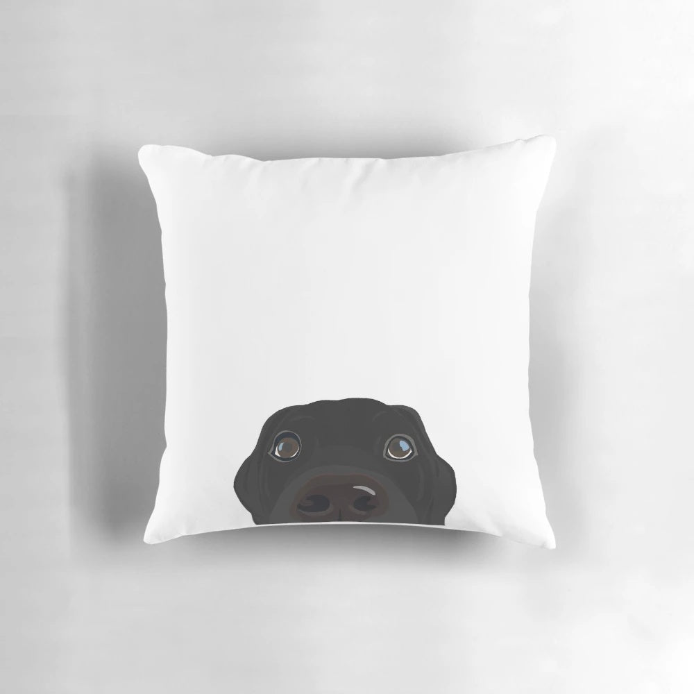Soft, plush pillow featuring a curious and cute black labrador retriever puppy