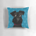 Black Miniature Schnauzer Dog Resting on a Pillow with Blue Daisies