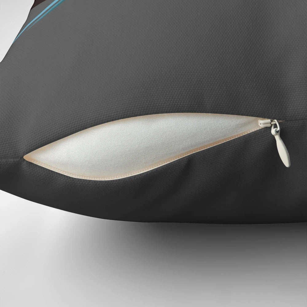 Closeup image of a blue parakeet on a decorative pillow