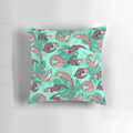 A vibrant and whimsical throw pillow featuring a playful cartoon illustration of a blue tongue skink.