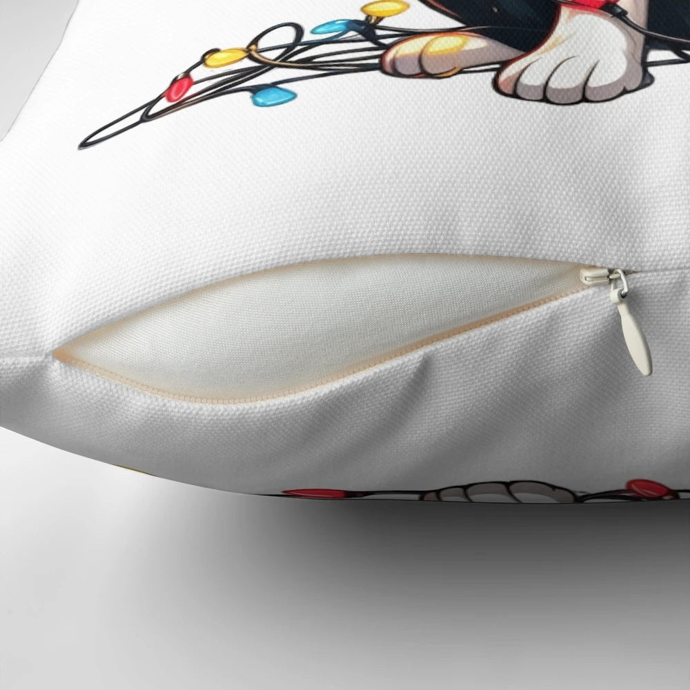 Cute border collie dog wearing a Santa hat on a Christmas-themed throw pillow