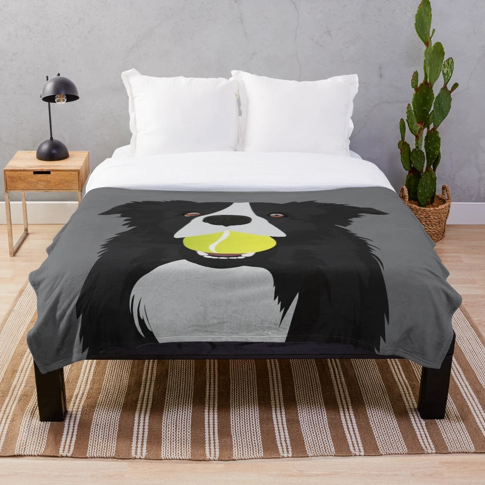 Cozy border collie plush blanket with a tennis ball