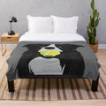 Cozy border collie plush blanket with a tennis ball