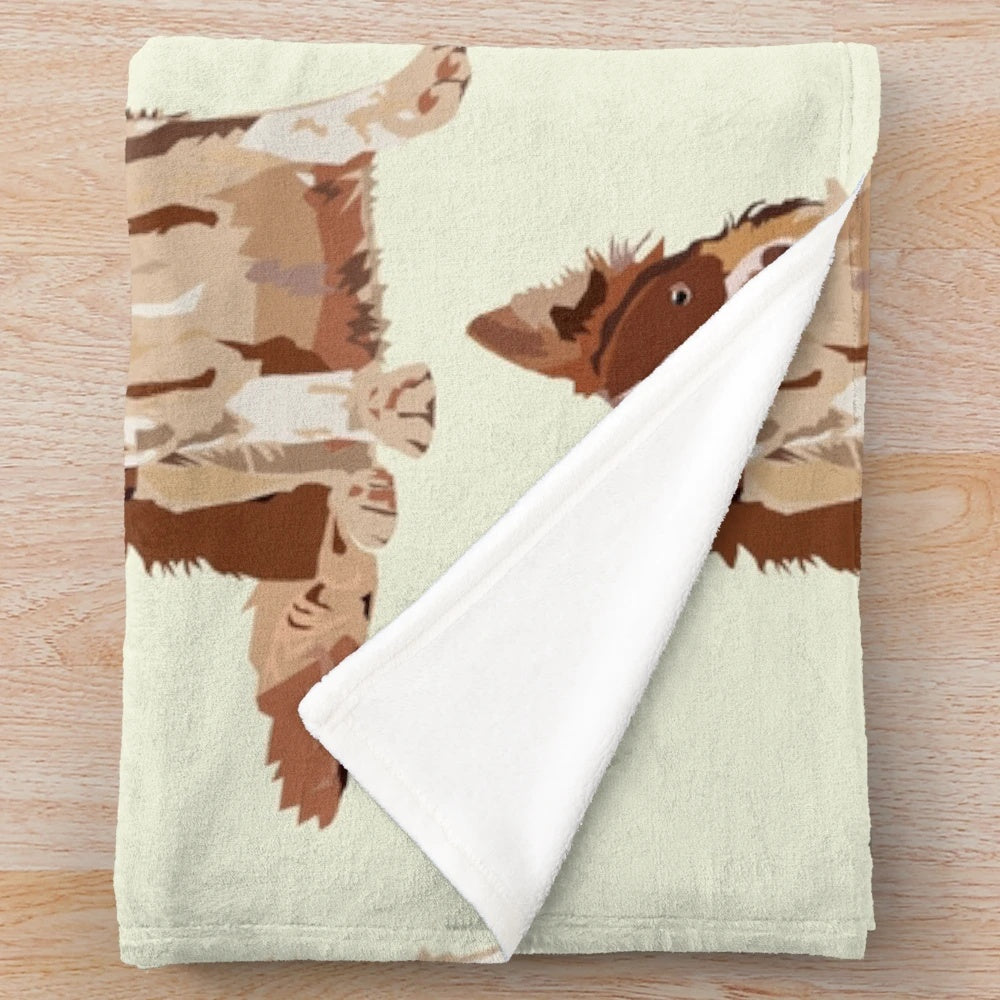 Cute and cuddly border collie dog on a plush blanket