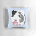 Soft, cuddly guinea pig pillow in bubble gum pink color, perfect for kids' rooms and nurseries.