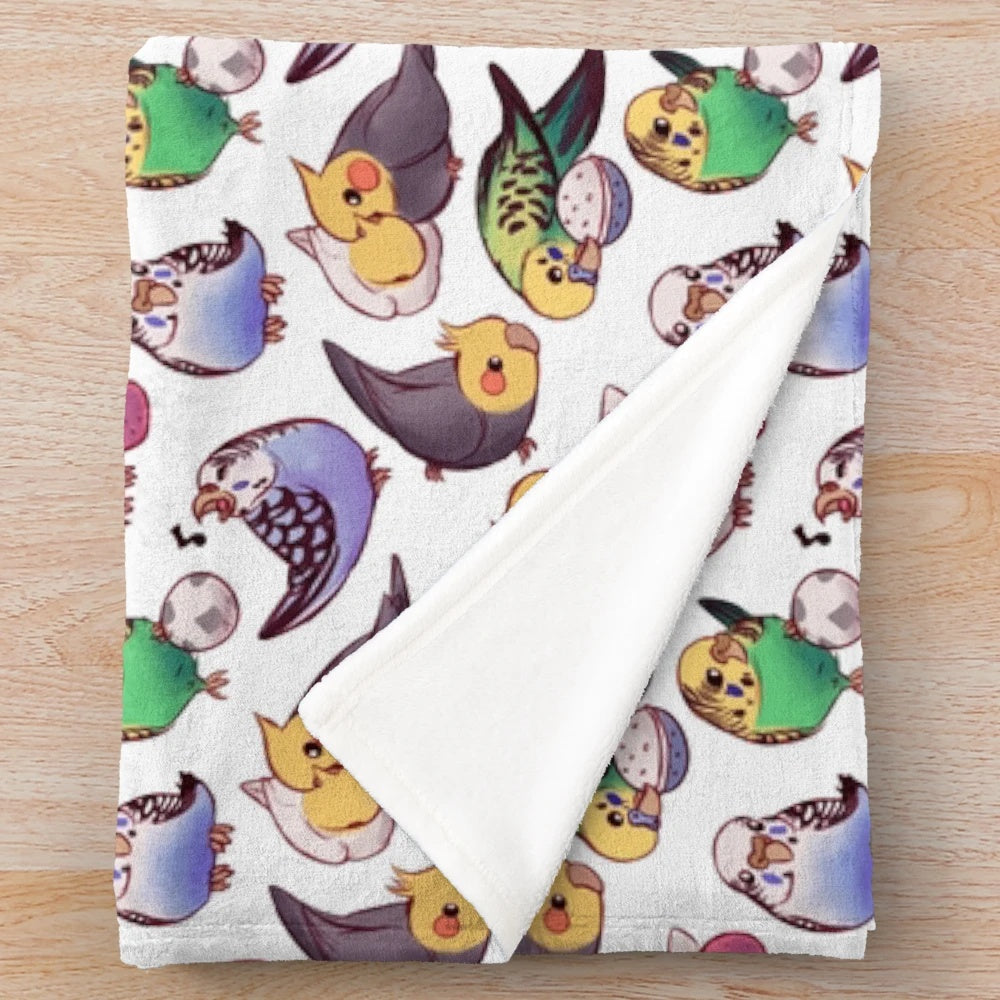 Soft and cozy plush blanket featuring a pattern of cute budgies and cockatiels