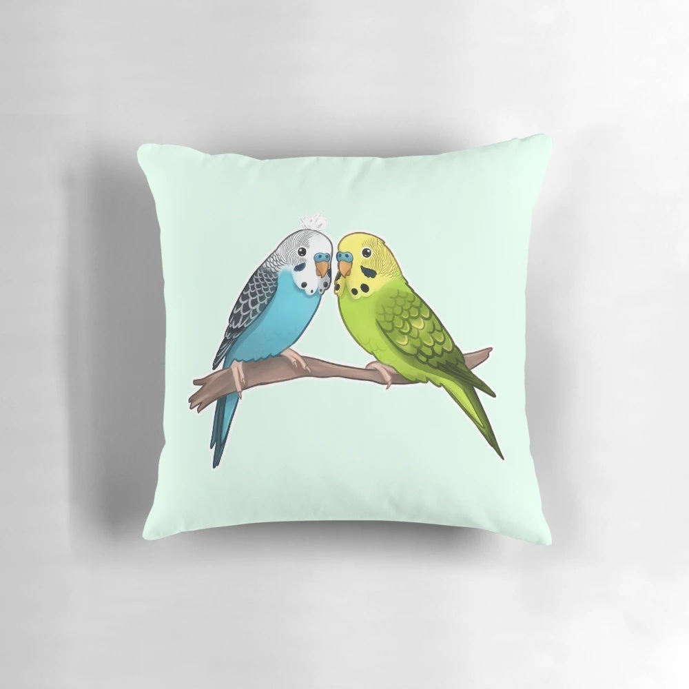 A plush, decorative pillow featuring a cute, colorful budgie or parakeet design.