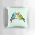 A plush, decorative pillow featuring a cute, colorful budgie or parakeet design.