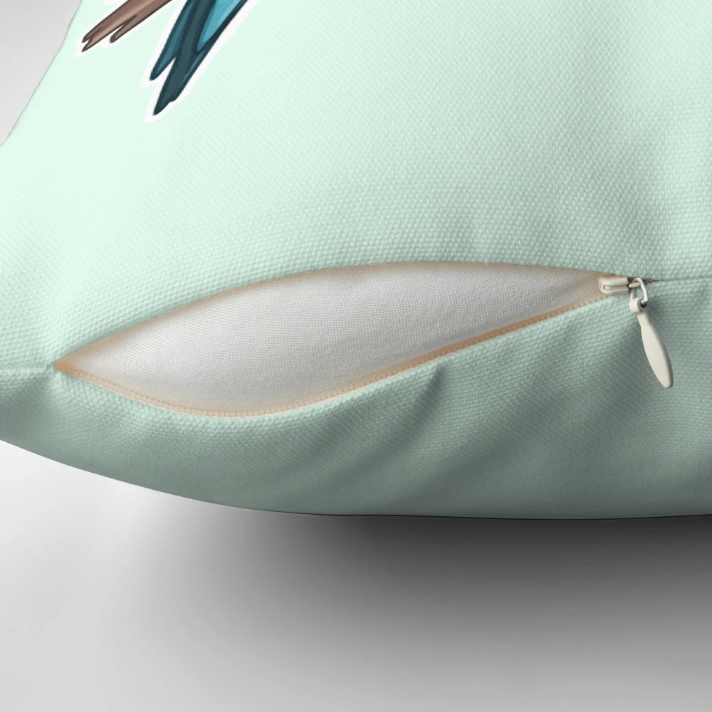 A plush, decorative pillow featuring a cute, colorful budgie or parakeet design.