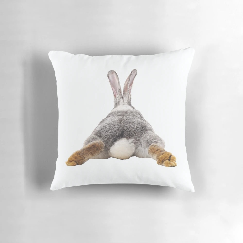 Soft, plush decorative pillow featuring a cute bunny rabbit's tail and butt.