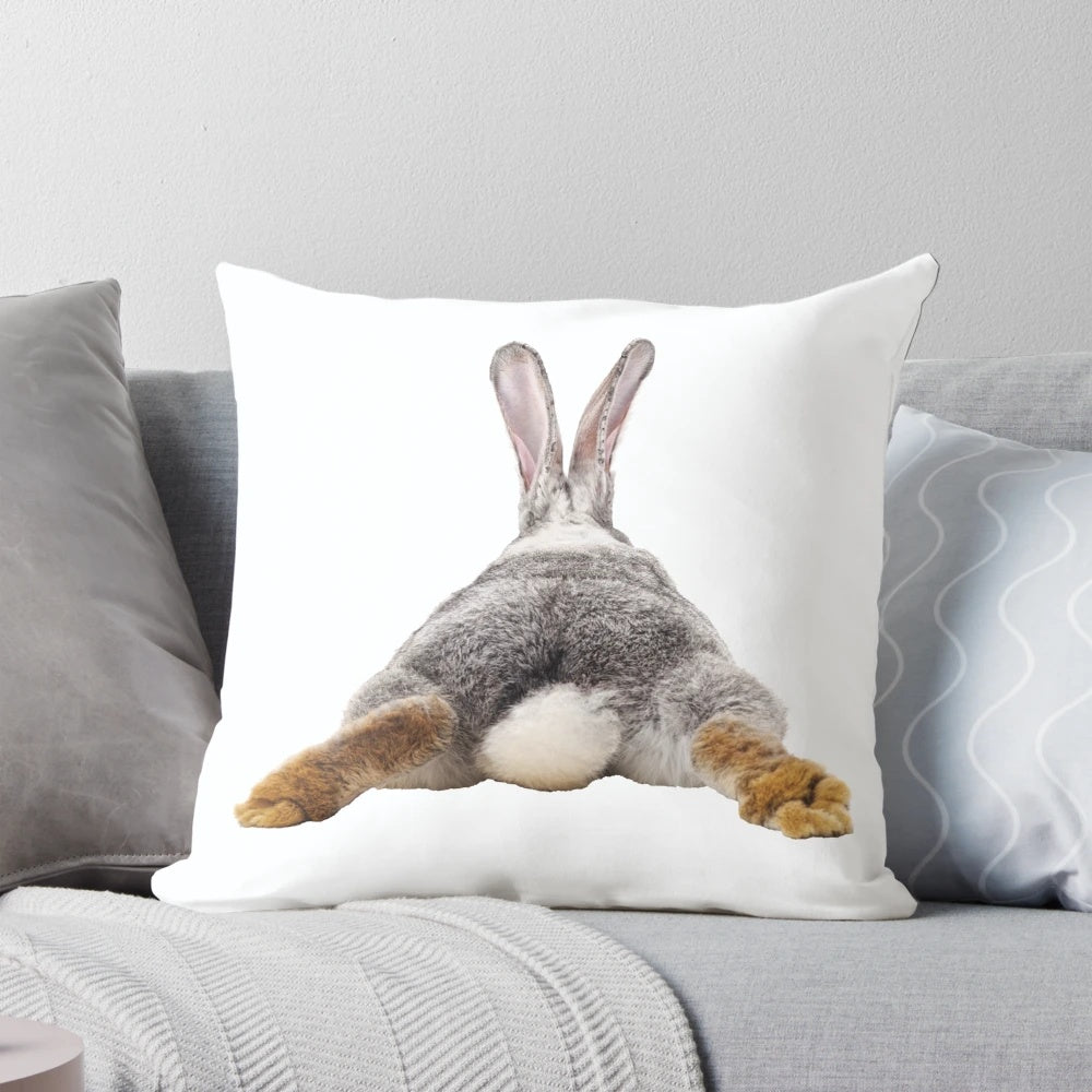 Soft, plush decorative pillow featuring a cute bunny rabbit's tail and butt.
