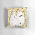 Colorful pillow featuring butterflies, bees, and floral designs