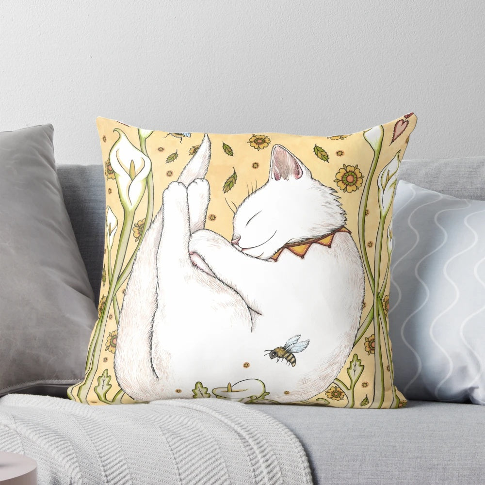 Colorful pillow featuring butterflies, bees, and floral designs