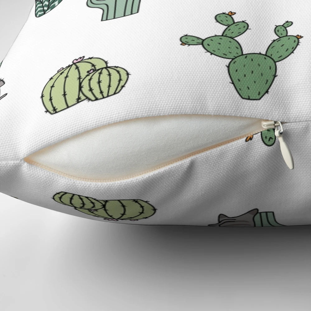 Colorful pillow featuring cute cats among cacti plants