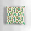 Tan background with a cheerful cactus pattern design on a plush, decorative pillow.