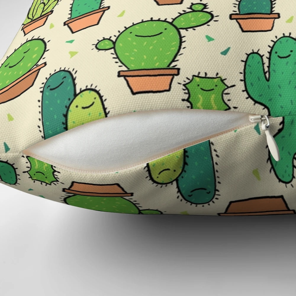 Tan background with a cheerful cactus pattern design on a plush, decorative pillow.
