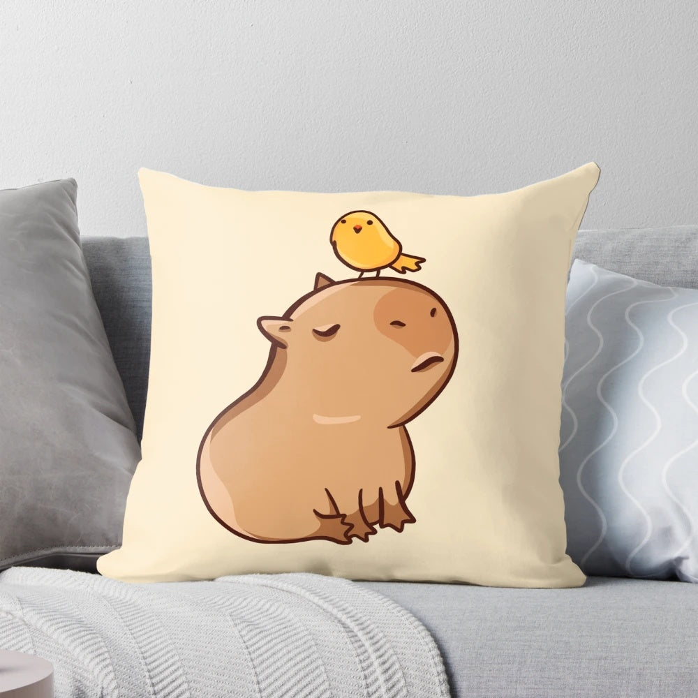 Soft and plush pillow featuring a cute capybara and bird design