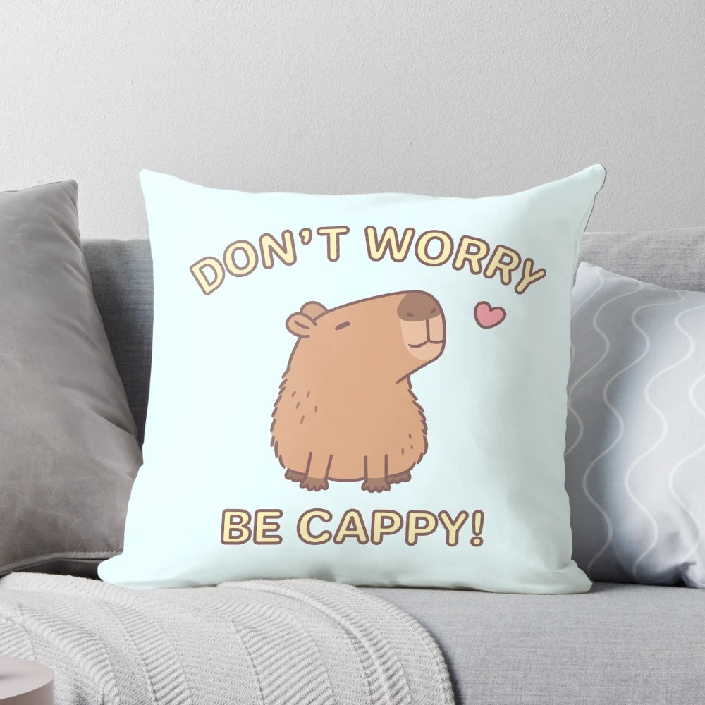 Cute and hilarious capybara-themed throw pillow with "Don't Worry, Be Cappy!" text