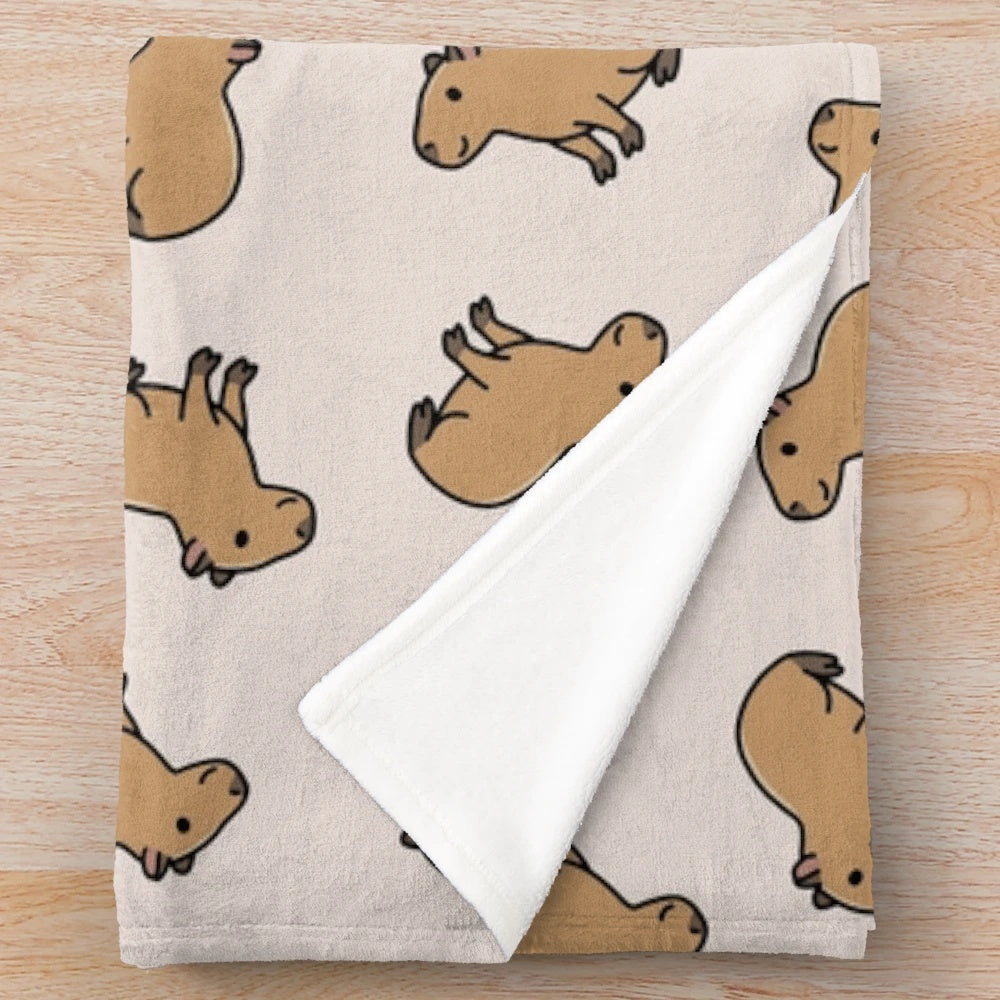 Soft and cuddly capybara plush blanket for cozy comfort